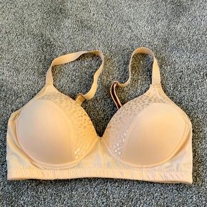 Nude colored bra.